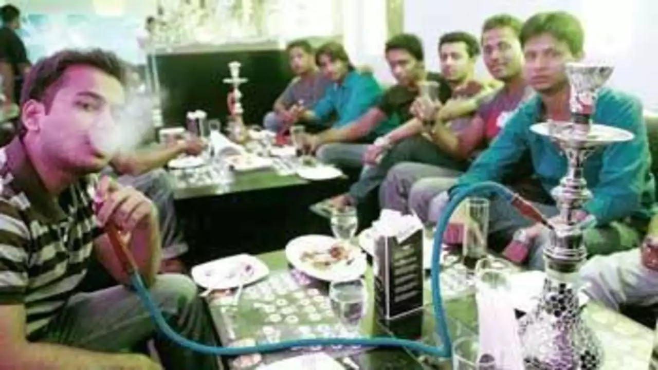 Gujarat has become a hookah bar! Taporis sitting in the garden in Ahmedabad rather than a hookah party in public