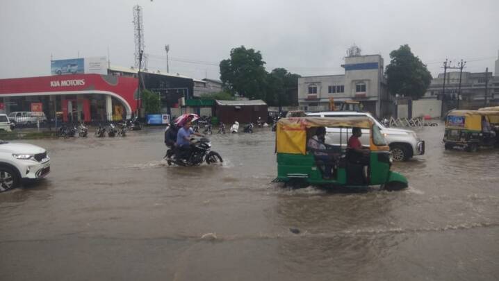 megh-maher-in-rajkot-even-today-roads-watered-by-two-inches-of-rain-water-aji-2-dam-gate-opened-1-foot