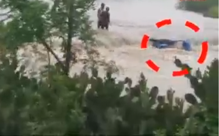 the-thunderous-form-of-the-clouds-the-rushing-water-swept-away-the-entire-tractor