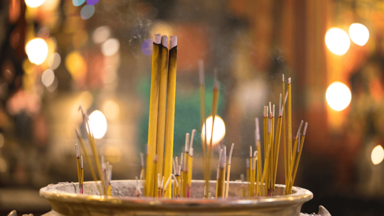 What is the rule for lighting lamps and incense sticks in the worship of God?